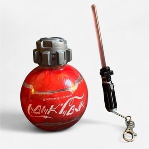 Coca Cola Star Wars Galaxy's Edge Lmt Edition bottle. Darth Vader saber keychain